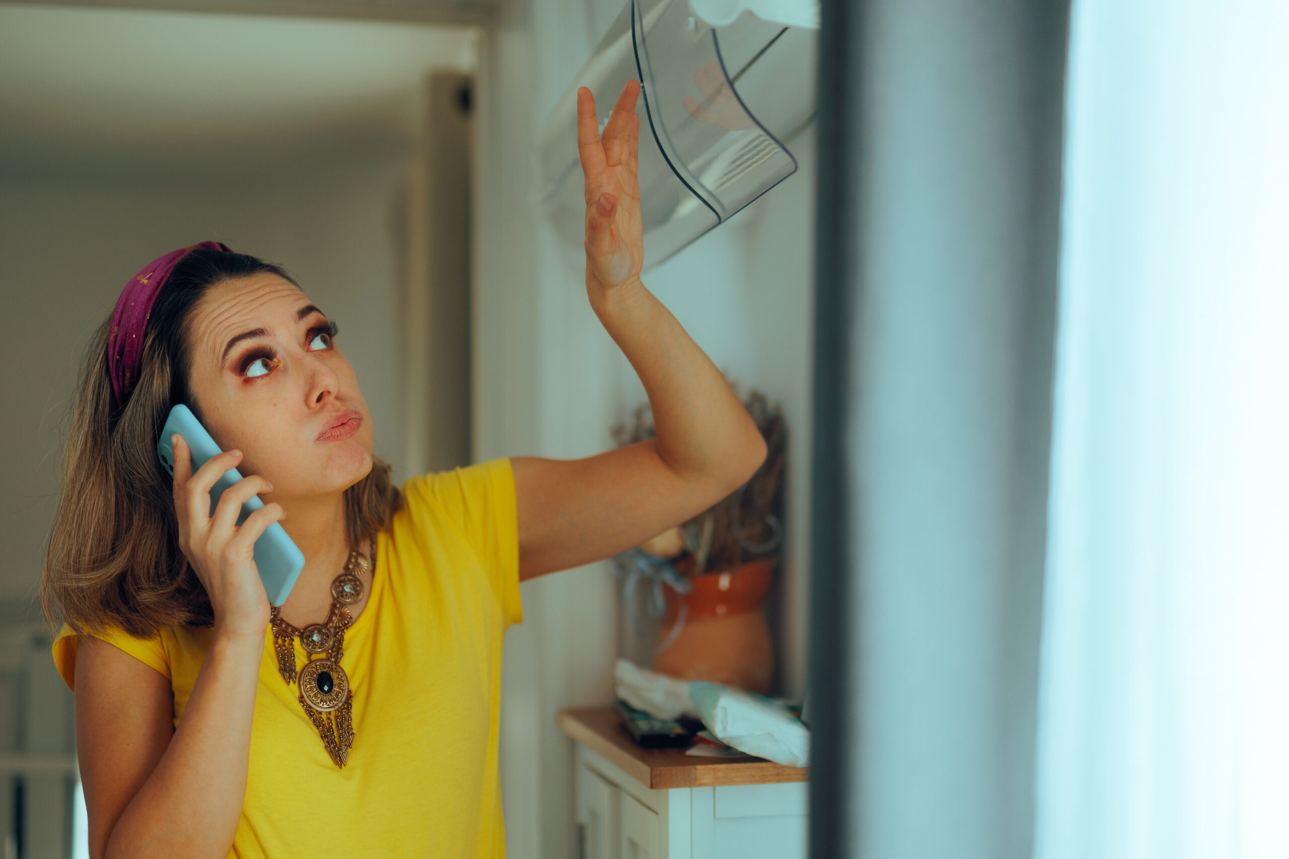 AC repair technician helping homeowner in Sacramento